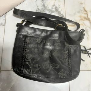 The Sak brand adjustable strap purse